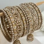 Antique gold kade bangles jhumki gajre stone